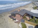 Arial view of the home showing stairs down to the sand and unbeatable location